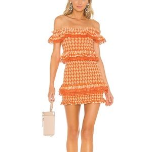 Tularosa orange and white woven look Teri dress.
